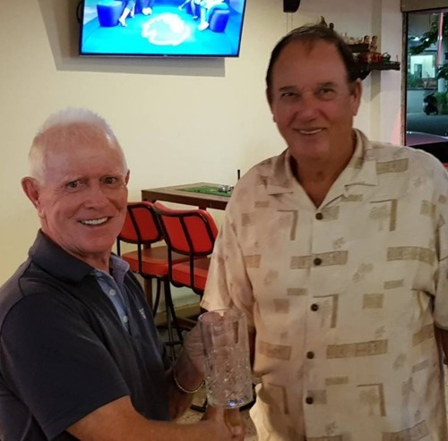 Jimmy presents the Golfer of the Month trophy to Michael Brett.