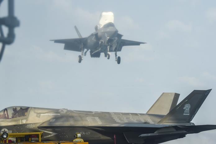 F-35B Lightning II fighter aircraft assigned to the 31st Marine Expeditionary Unit (MEU), Marine Medium Tiltrotor Squadron (VMM) 265 (Reinforced) land on the flight deck of amphibious assault ship USS America (LHA 6) in support of Exercise Cobra Gold 2020, Feb. 29, 2020. (U.S. Navy photo by Mass Communication Specialist 1st Class Rufus Hucks)
