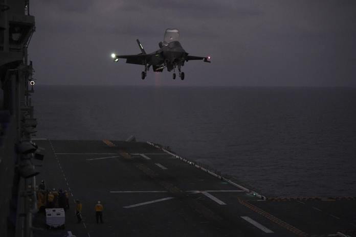 An F-35B Lightning II fighter aircraft assigned to the 31st Marine Expeditionary Unit (MEU), Marine Medium Tiltrotor Squadron (VMM) 265 (Reinforced), lands on the flight deck of amphibious assault ship USS America (LHA 6) in support of Exercise Cobra Gold 20, March 5, 2020. (U.S. Navy photo by Mass Communication Specialist Seaman Jonathan Berlier)