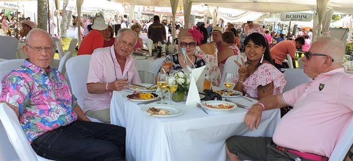 A total of 21 PCEC expats took advantage of the transportation to and from the Pink Polo event, but had to separate to obtain tables. Here (L to R) Richard Smith, David Rubenstein, Alex Rubenstein, Tina Lappert and Don Lappert enjoy a nice lunch before the matches get underway.
