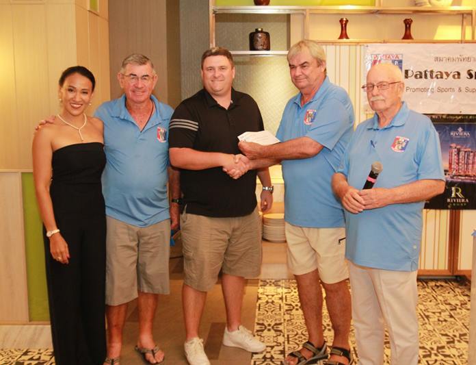 Adam Barton and Kerry Beck were crowned champions of the 24th PSC Charity Classic held at the popular Rayong Green Valley course on the 11th March. Shown here, Adam Barton, representing himself and teammate Kerry Beck, accepts the team’s prizes from Golf Chairman Jack, with PSC Office Manager Ing, Vice President Tim, and MC Nigel. Over 100 golfers took part in the annual event, raising more than 100,000 baht for charity.