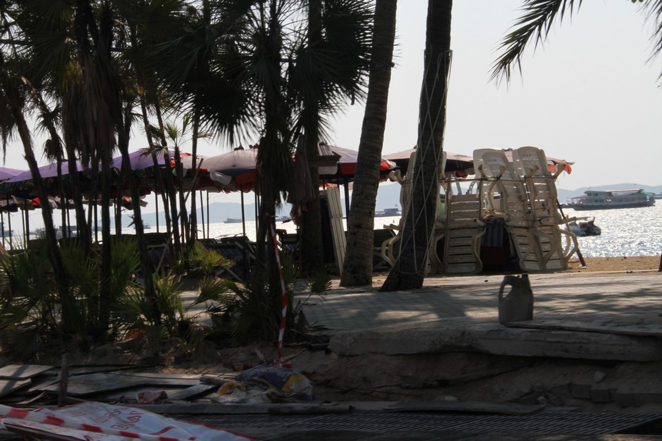 Beach chairs everywhere but no one to rent them to.