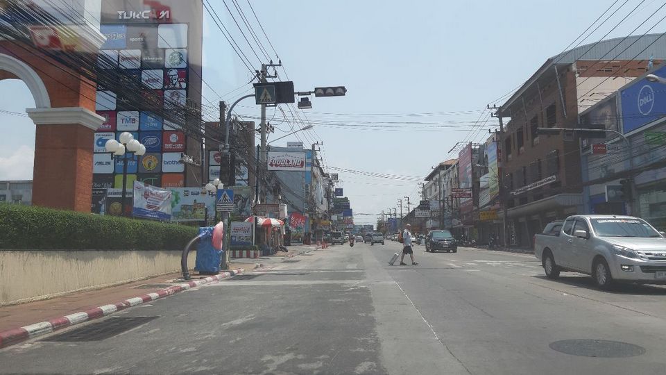 Central Road looks forlorn as traffic is sparse and shops are closed. Some businesses such as groceries stores and fresh food supermarkets remain open for people to buy their daily needs.