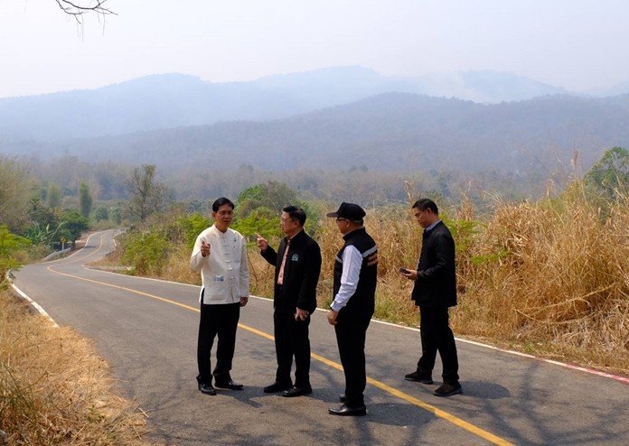 Pralong Dumrongthai, director-general of the Pollution Control Department and his team visit hotspots where smoke and wildfires remain a problem near downtown Chiang Mai.