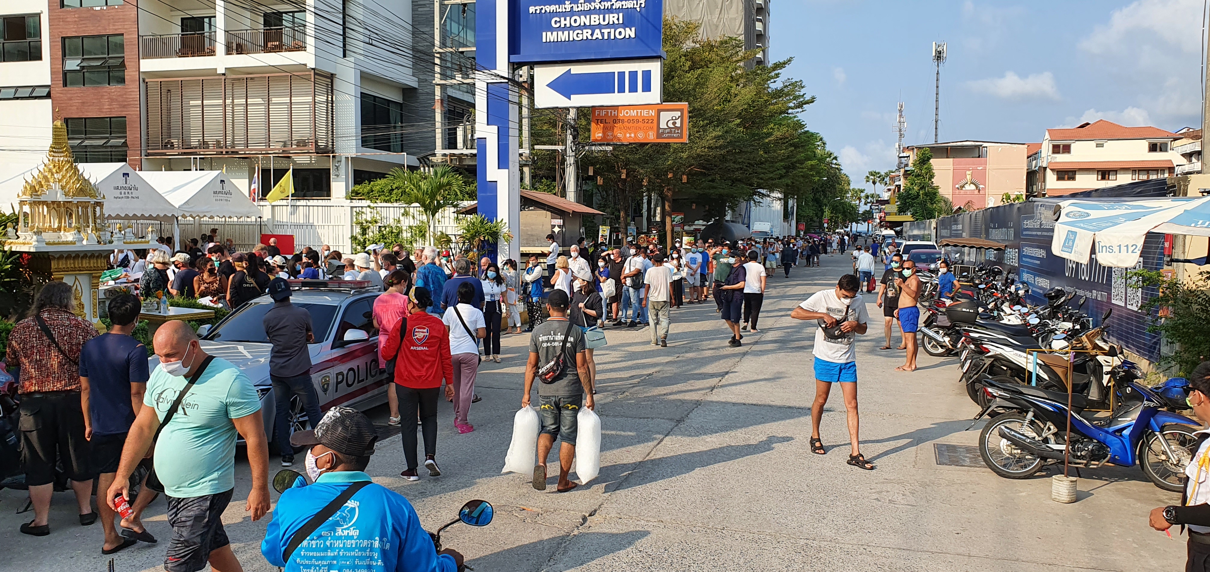 The long line at Jomtien Immigration sent in by a reader Wednesday morning, April 8 prompted the opening of the new office at Pattaya School #7. It has since been closed.