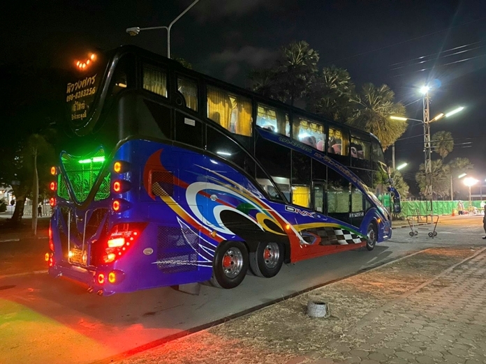 A bus arrives at a navy quarantine facility where Thais returning from overseas are now being held after arriving on two flights from Japan and the U.S.