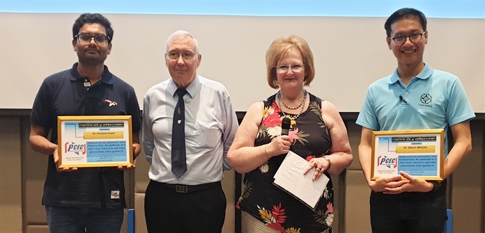 MC Ann Ensell presents the PCEC's Certificates of Appreciation for the presenters from Bangkok, Dr. Hisham and Dr. Wasin. Professor Andy Barraclough, from Pattaya, has been the recipient of several Certificates for his previous presentations to the PCEC.