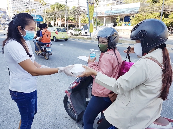 Whether on foot or on motorbikes everyone was given food and water as they came by.