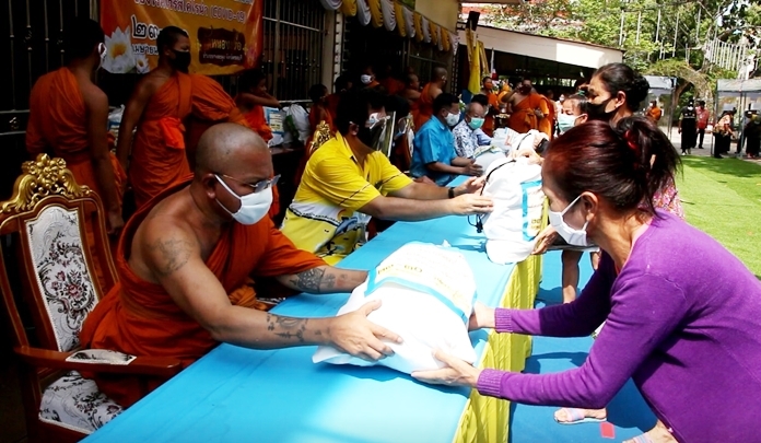 Every day, Nongprue Temple gives out bags of food and necessities to Pattaya-area residents struggling under the coronavirus lockdown.