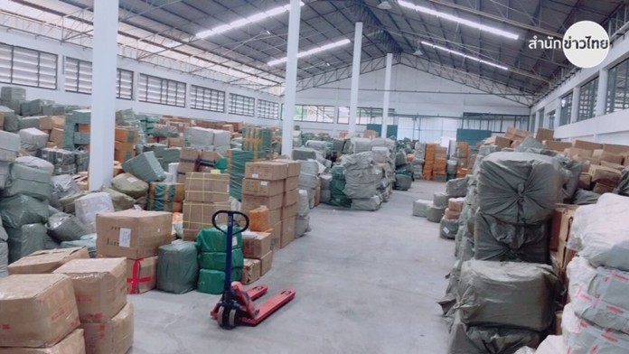 Officials seize 160,000 surgical masks, 81,600 cloth masks, 473,974 alcohol gel, 1,280 thermometers and 4,000 (Personal Protective Equipment) PPE suitsat a warehouse in Bangkok’s Samae Dam area.