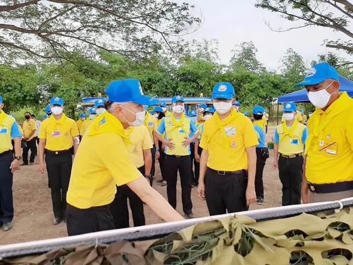 Government officials inspect the model farm project under the Royal Initiative of Her Majesty Queen Sirikit, at Sawangha district in Angthong province.