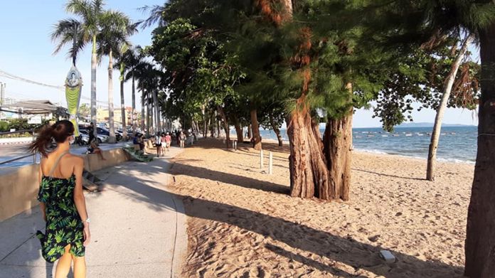 Jomtien Beach, Pattaya City, Chonburi Province on a beach close day. People are allowed to use only the beach footpath for walking and individual activities.
