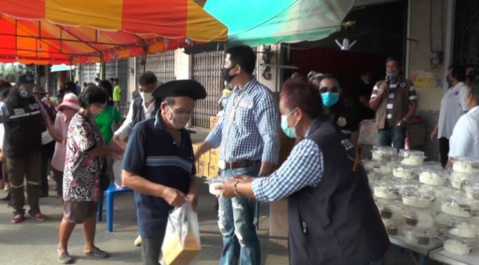 Local people arrived early morning to be in a long queue to receive lunchboxes in Nakhon Rachasima province.