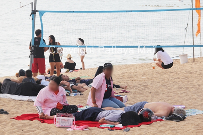 Beach masseuses could eke out a living before the pandemic hit Pattaya, and hope to do so again once the restrictions are lifted.