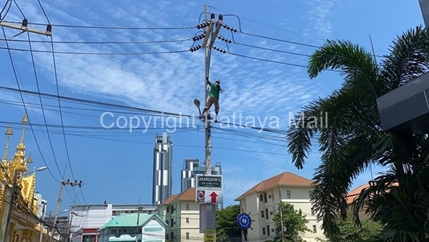 Paiboon Wisedsri, drunk and angry, climbed up a Pattaya utility pole to protest being denied government coronavirus compensation.