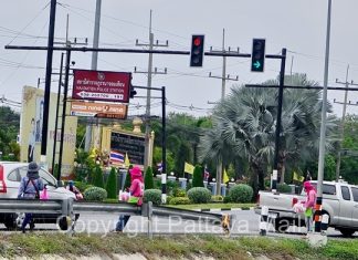 Pattaya traffic-dodging donut sellers happy for job