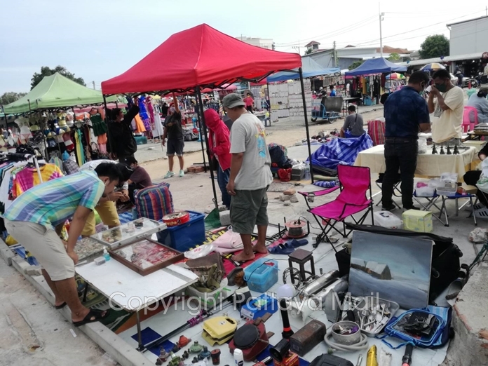 People who used to have well-paying jobs are now selling personal goods and second-hand items at Pattaya markets to survive.