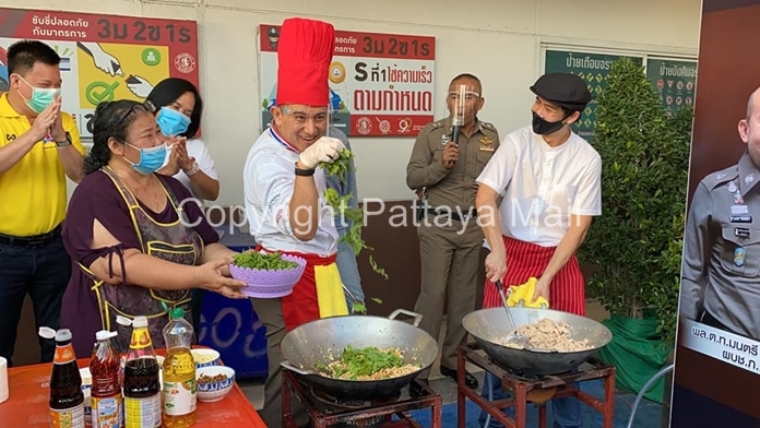 Pol. Col. Khemmarin Pissamai shows off his cooking style.