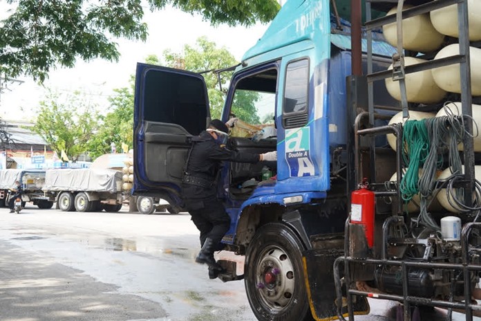 Every cargo truck entering the country from Cambodia go through disinfection process at Ban Klong Luk border crossing.