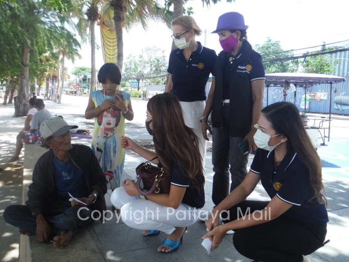 The Rotarians also walked along beach road talking to the residents and handing out cash to those who really needed it.