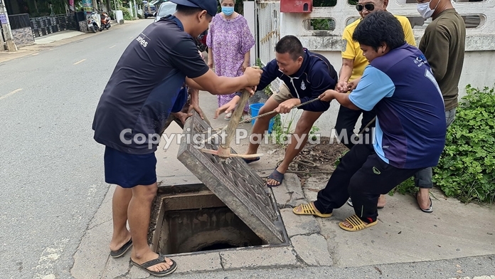 Finally, using leverage works and the grate is opened.