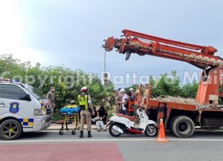 Helmetless biker runs into parked crane outside Pattaya