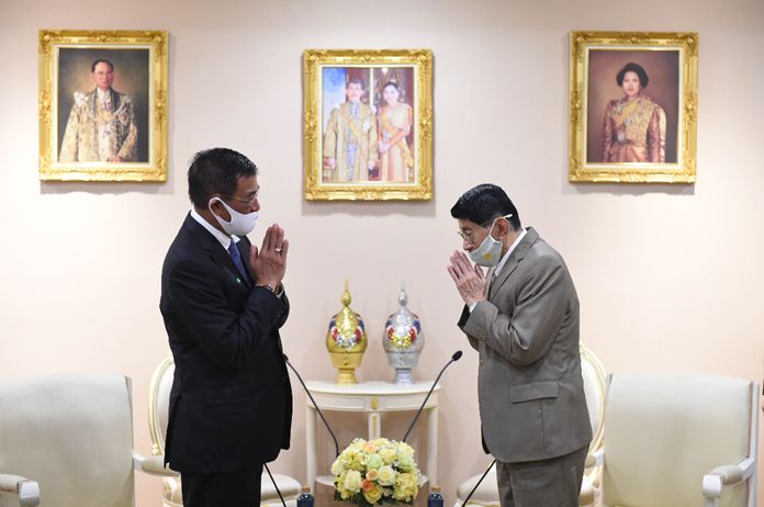 H.E. Mr. Ahmad Rusdi, Ambassador of Indonesia to Thailand (left), paid a courtesy call on Deputy Prime Minister Wissanu Krea-ngam (right) on occasion of his completion of tenure.
