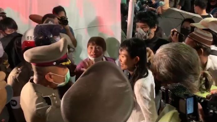 Thai police officers were watchful on the activities believed to violate the state of emergency law that the government has declared since late March.