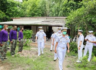 Thai navy repairs Ban Chang schools, temples, homes The rear admiral brought sailors to repair retired sailor Prasert Lim’s home.