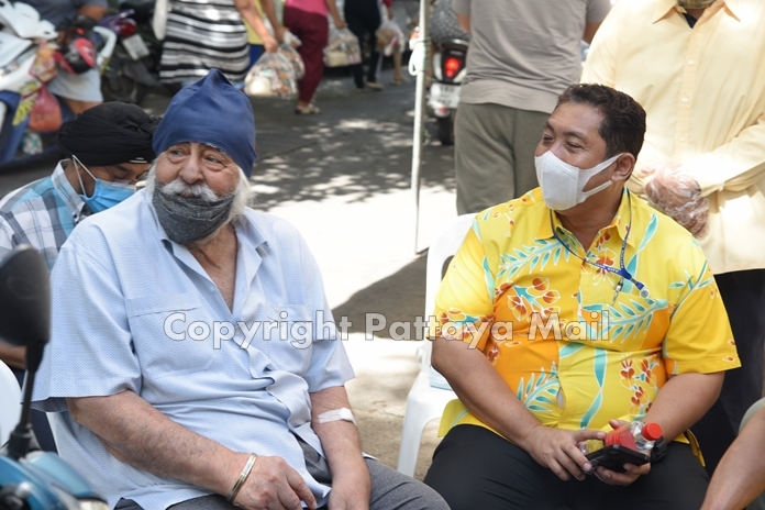 Amrik Singh sits with Mayor Sonthaya Khunplome during the charity event to distribute food to the needy on June 8, 2020. This was to be one of Amrik’s last deeds of benevolence on earth.