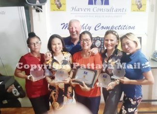 Winners all: Sa, May, Nu, Thip and Prae, with Brian Chapman in the back.