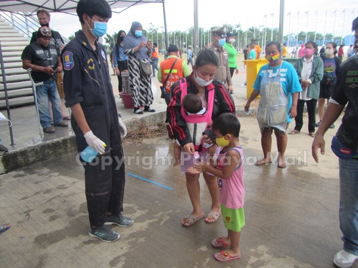 Everyone, young and old, is temperature checked and hands washed.