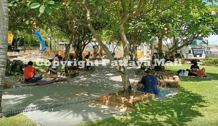 Life is back to ‘new normal’ where people can relax, read books, and eat under trees at Lan Pho.