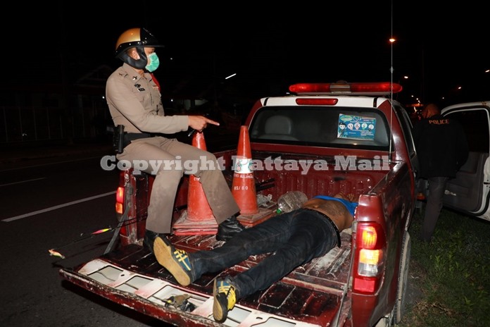 Safely placed on the police pickup truck, the man was taken to the Sattahip police station to sleep it off.