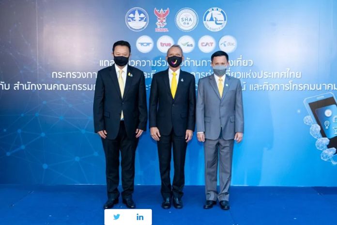 Mr. Yuthasak Supasorn, TAT Governor (left), H.E. Mr. Phiphat Ratchakitprakan, Minister of Tourism and Sports (centre), and Colonel Natee Sukonrat, Vice Chairman of the NBTC (right).