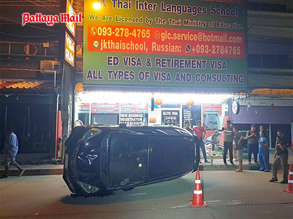 Reckless American driver causes car to flip over in Pattaya Pattaya Mail
