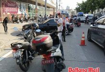 Motorbike and car collide on Phettrakun Road in Pattaya, two injured