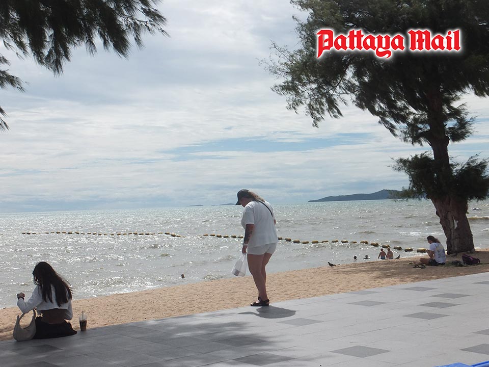 Light fog and cool breezes welcome tourists to Jomtien Beach in Pattaya’s mild winter