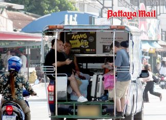 Tourists count their remaining holiday cash as Thai baht tightens its grip on Pattaya