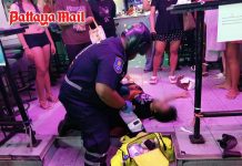 Emergency on Soi 6, Pattaya officers clear traffic as ambulance rushes seizing bar worker to hospital