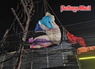 Sky turns dangerous as giant kite plunges onto bar and entangles high-voltage lines in Pattaya