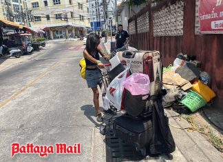 Woman caught collecting and dumping trash outside Pattaya homes
