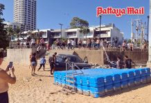 Black pickup crashes through fence and lands on beach in shocking Jomtien incident
