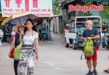 Pattaya tourists continue arriving at Koh Larn Pier as storm clouds gather