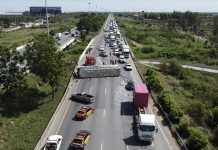 Bus carrying factory workers overturns on Asian Highway in Ayutthaya, 13 injured