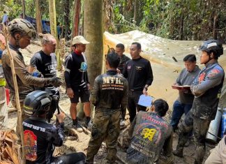 Thai cave rescue veterans join race to save seven trapped in flooded Laos cave