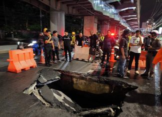 Bangkok crews work through night to fix road collapse