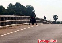 Police talk man with a lot on his mind off bridge in Ang Thong