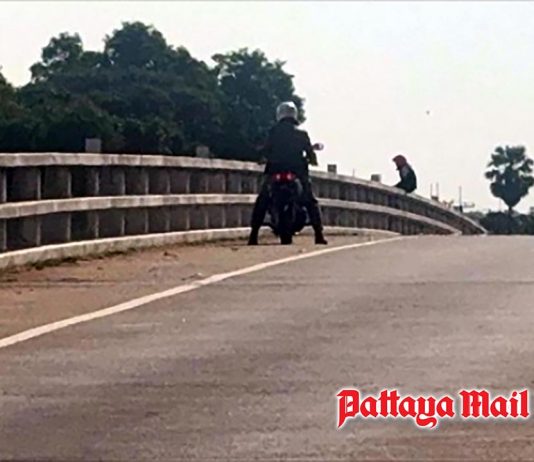 Police talk man with a lot on his mind off bridge in Ang Thong
