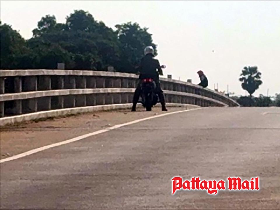 Police talk man with a lot on his mind off bridge in Ang Thong